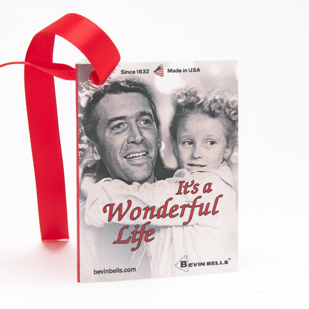 card with a red ribbon, featuring a classic movie scene and text 'It's a Wonderful Life'.